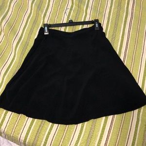 Flowy A line black skirt.